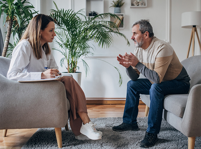 The Blue Crew is working on a mural painting.