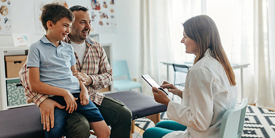 Parent with child at doctor's office