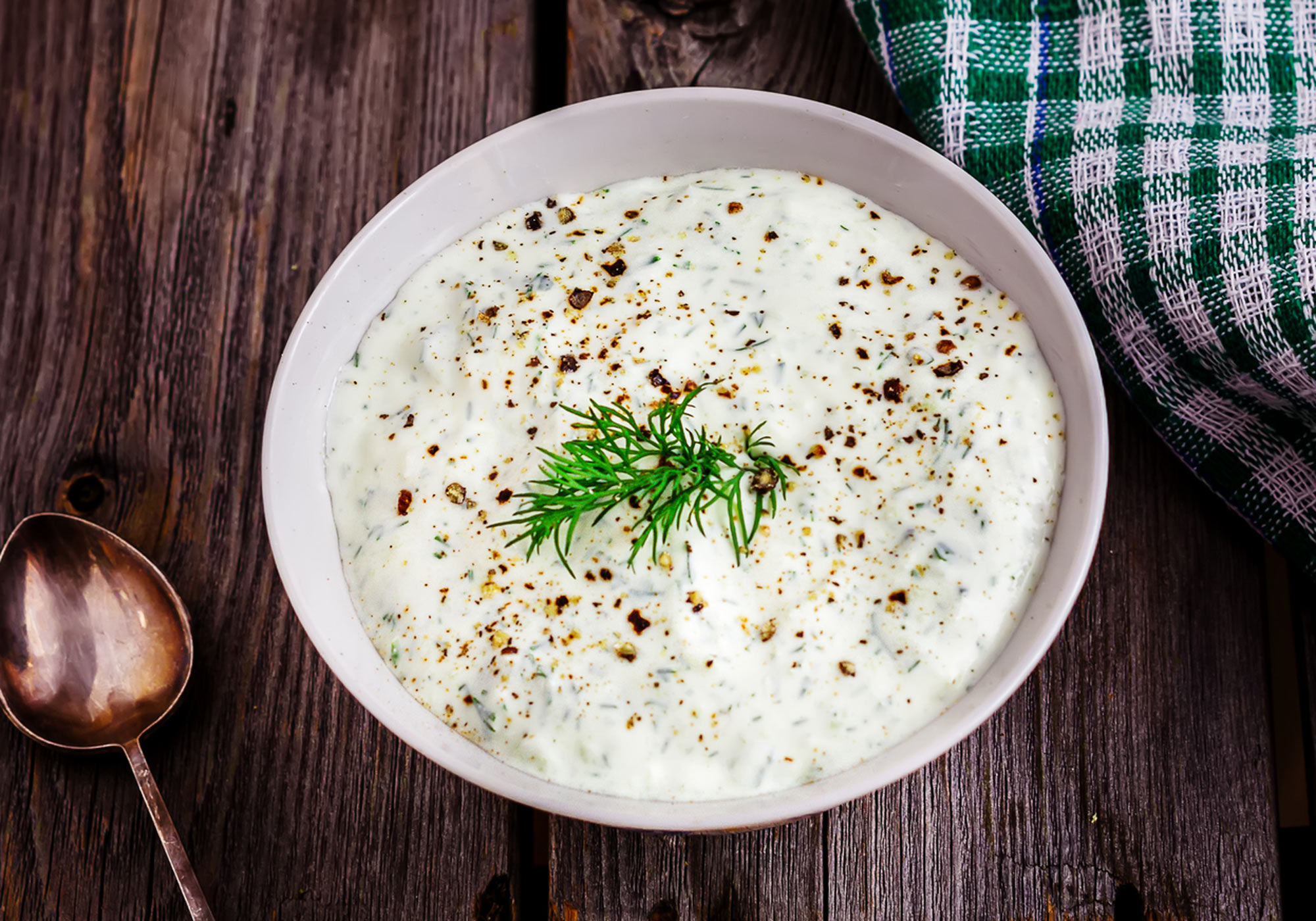 Photo: Creamy Herb Sauce on a rustic table setting.