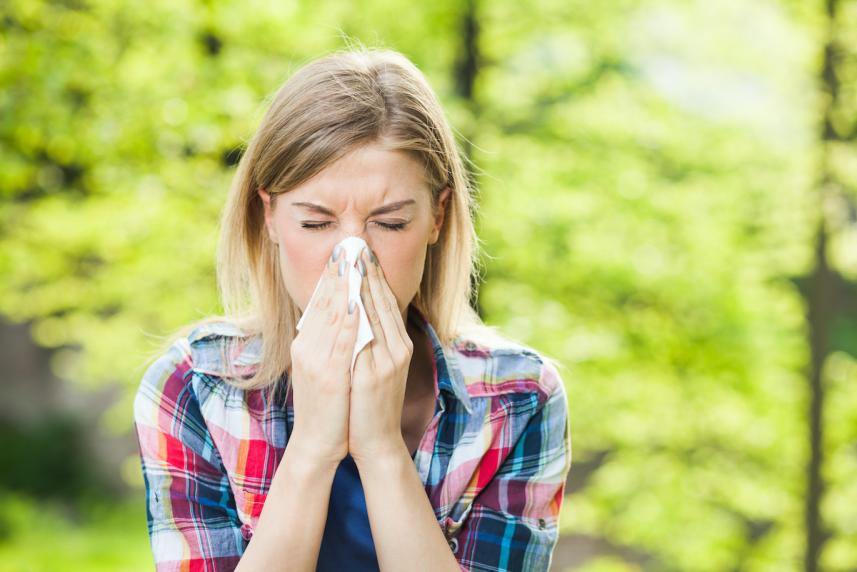 woman sneezing