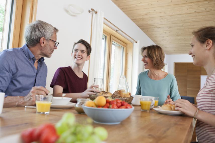 family sitting at table