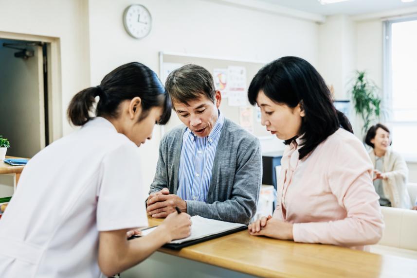 Doctor talking to patient