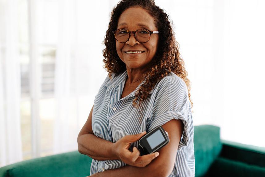 Woman checking blood pressure