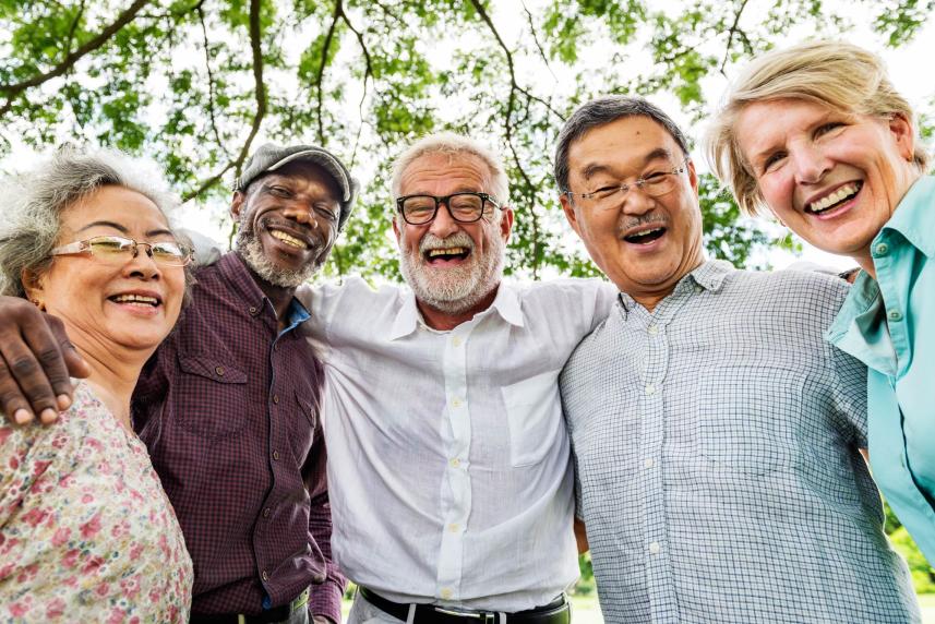 Photo: A group of friends smiling at camera.