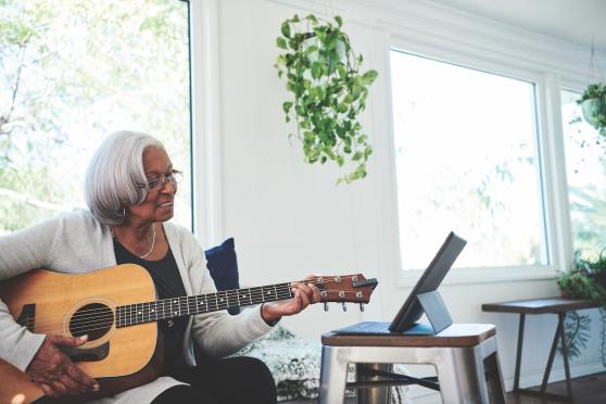 woman playing guitar