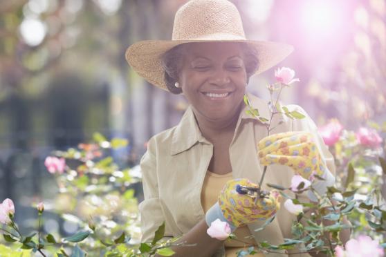 older woman gardening by herself