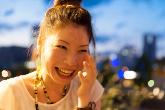 Woman wiping happy tears from her eyes