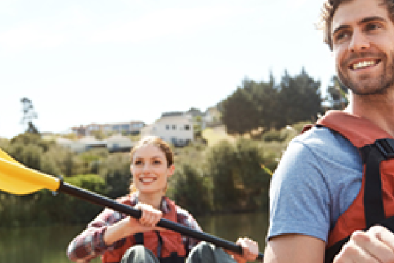 people Kayaking