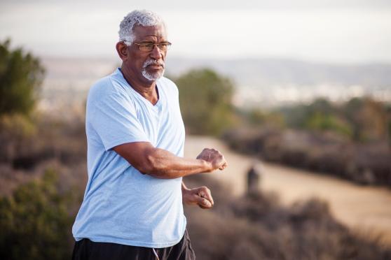 Photo: Man exercising outdoors.